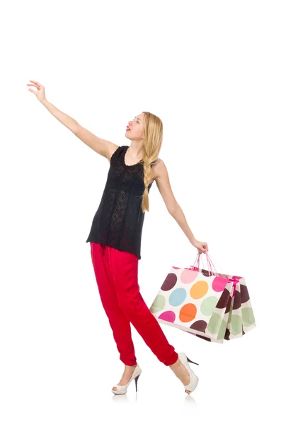 Mujer joven caucásica con bolsas de plástico aisladas en blanco — Foto de Stock