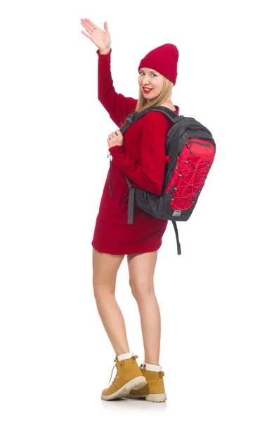 Pretty girl in red dress and backpack isolated on white — Stock Photo, Image