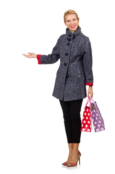 Pretty model in gray coat after shopping isolated on white — Stock Photo, Image