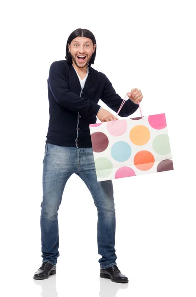 Joven sosteniendo bolsas de plástico aisladas en blanco —  Fotos de Stock