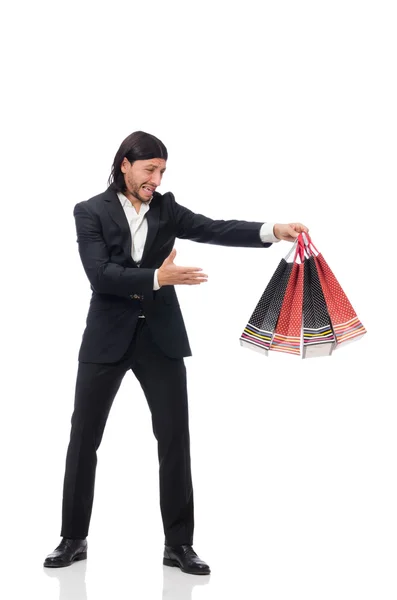 Traje negro hombre sosteniendo bolsas de plástico aisladas en blanco —  Fotos de Stock