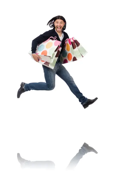 Young man holding plastic bags isolated on white — Stock Photo, Image
