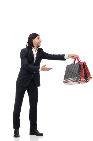 Traje negro hombre sosteniendo bolsas de plástico aisladas en blanco —  Fotos de Stock