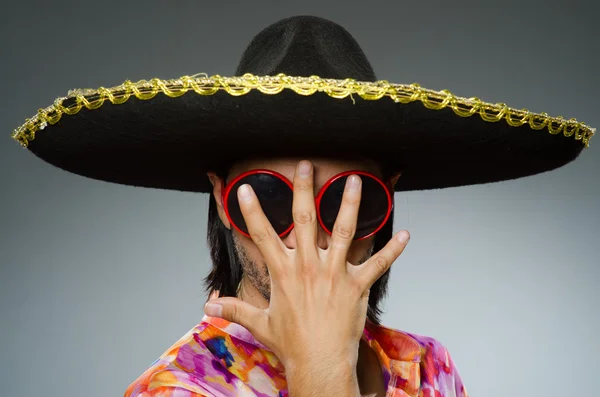 Young mexican man wearing sombrero