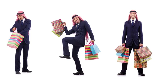 Arab man with shopping gifts on white — Stock Photo, Image