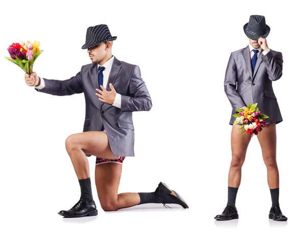 Nude businessman presenting flowers on white — Stock Photo, Image