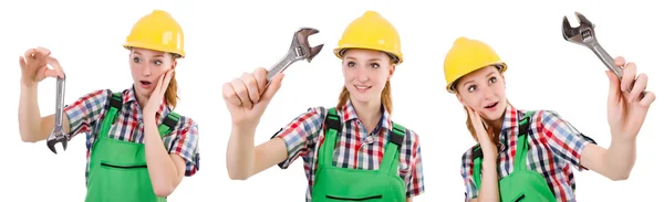 Constructon mujer trabajadora con llave inglesa aislada en blanco — Foto de Stock