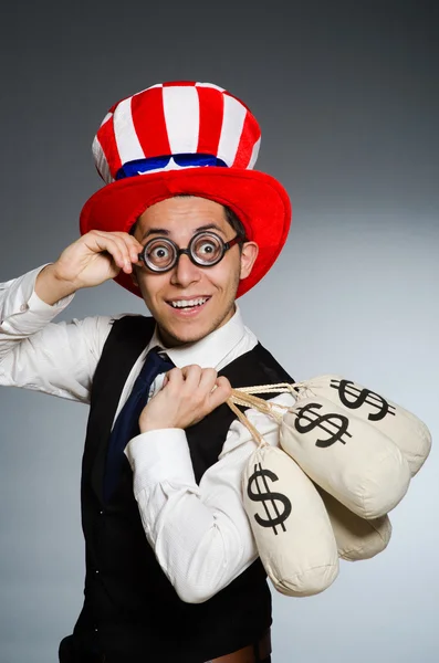 Man with dollar money sacks — Stock Photo, Image