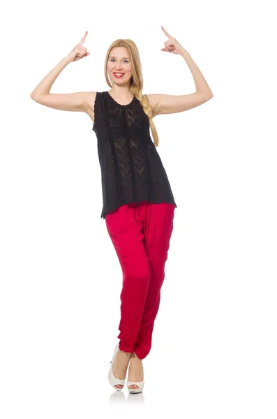 Tall young woman in red pants isolated on white — Stock Photo, Image