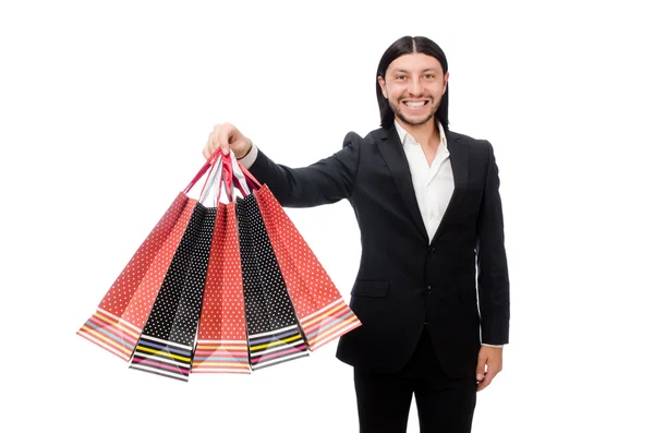 Zwarte pak man met plastic zakken geïsoleerd op wit — Stockfoto