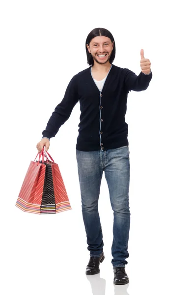 Joven sosteniendo bolsas de plástico aisladas en blanco —  Fotos de Stock