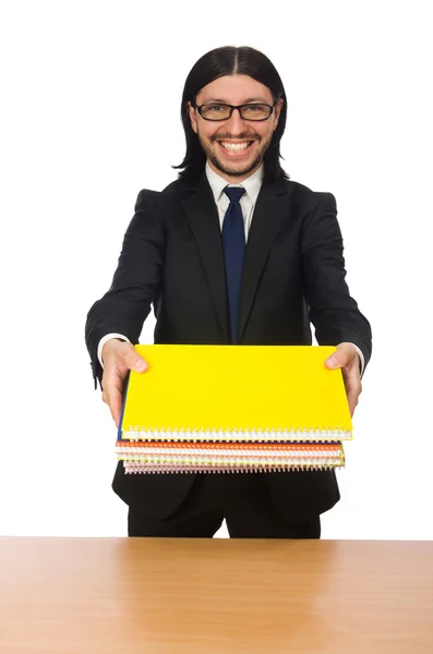 Empresario sosteniendo cuadernos aislados en blanco — Foto de Stock