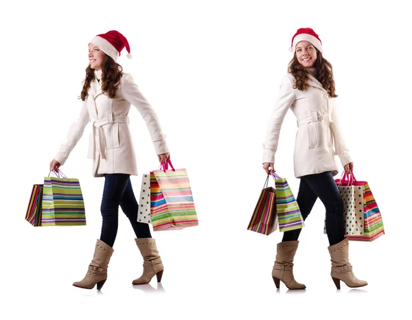 冬服の女性がクリスマスショッピングを行う — ストック写真