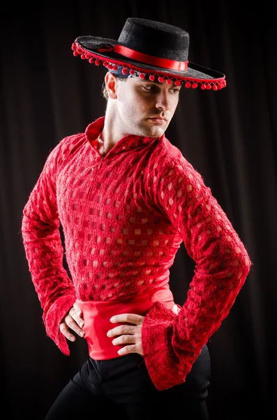 Man dancing spanish dance in red clothing — Stock Photo, Image