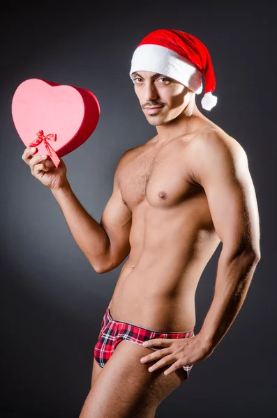 Ripped young man in studio concept — Stock Photo, Image