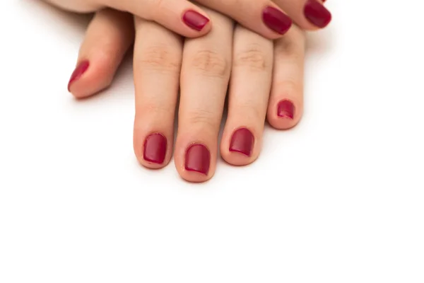 Woman hands with red nail isolated on white — Stock Photo, Image