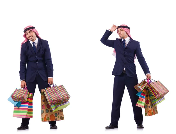 Arab człowiek z prezenty na biały — Zdjęcie stockowe