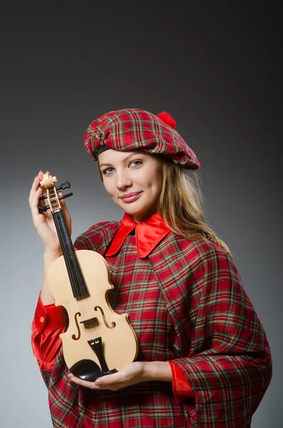 Nő skót ruházat zenei koncepció — Stock Fotó