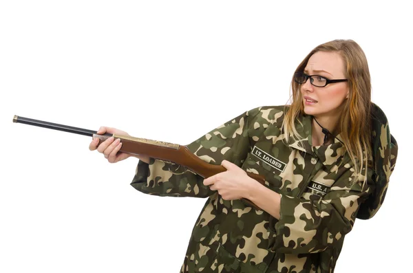 Chica en uniforme militar sosteniendo el arma aislada en blanco — Foto de Stock