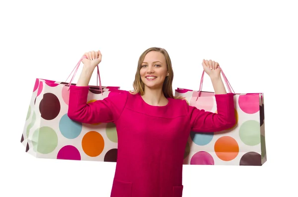 Shopper ragazza in abito rosa in possesso di sacchetti di plastica — Foto Stock