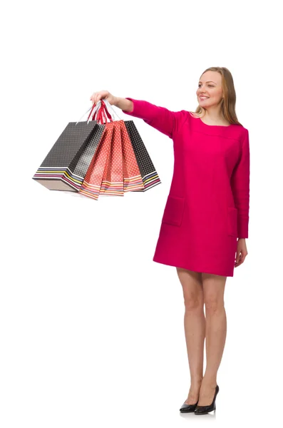 Menina Shopper em vestido rosa segurando sacos de plástico — Fotografia de Stock