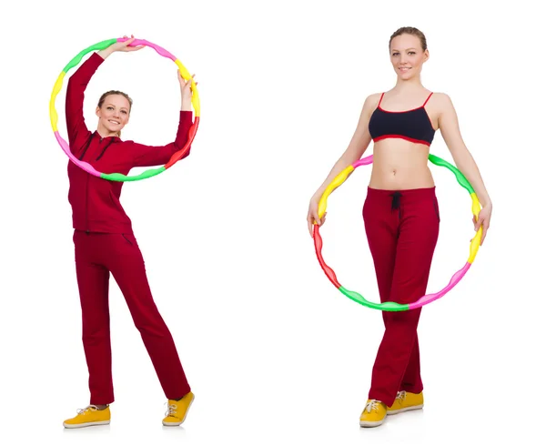 Mulher fazendo exercícios com hula hoop — Fotografia de Stock
