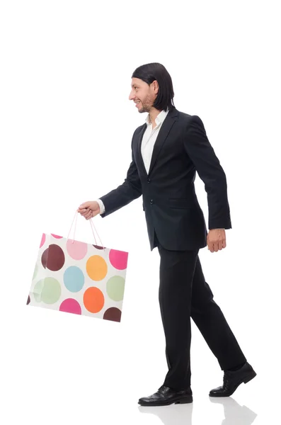 Traje negro hombre sosteniendo bolsas de plástico aisladas en blanco —  Fotos de Stock