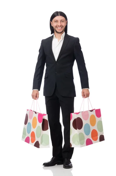 Traje negro hombre sosteniendo bolsas de plástico aisladas en blanco —  Fotos de Stock