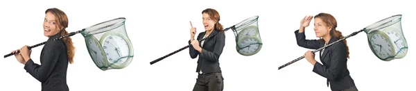 Woman with catching net and clock — Stock Photo, Image