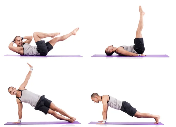 Man doing exercises on white — Stock Photo, Image