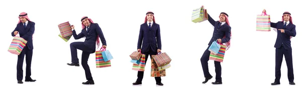 Arab man with shopping gifts on white — Stock Photo, Image