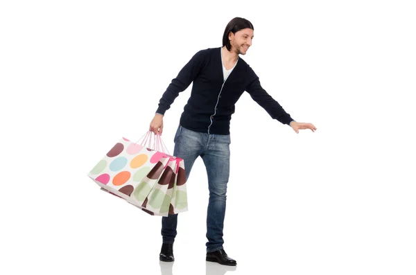 Joven sosteniendo bolsas de plástico aisladas en blanco —  Fotos de Stock