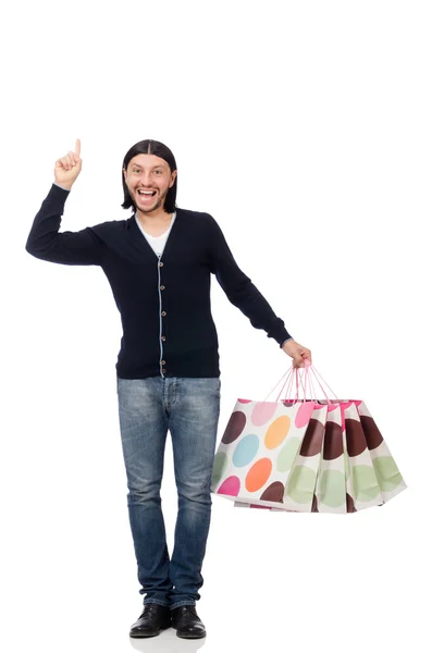 Young man holding plastic bags isolated on white — Stock Photo, Image