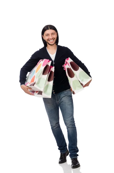 Young man holding plastic bags isolated on white — Stock Photo, Image