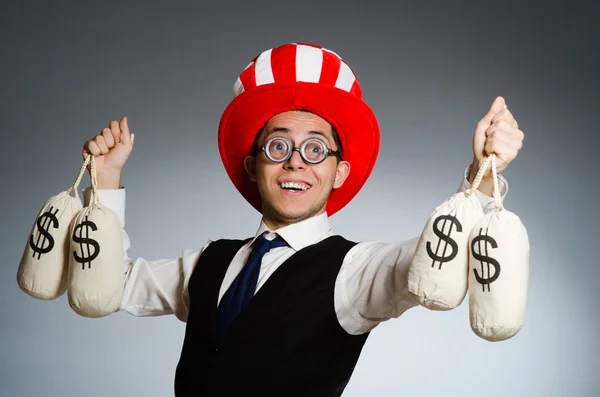 Man with dollar money sacks — Stock Photo, Image