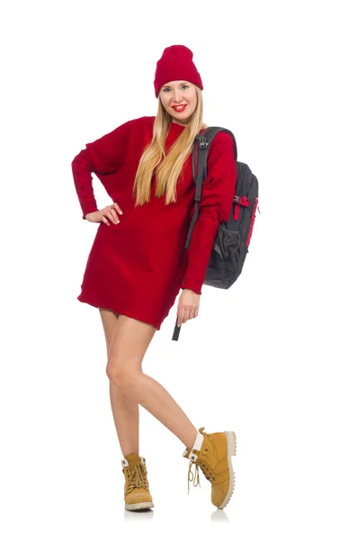 Jolie fille en robe rouge et sac à dos isolé sur blanc — Photo