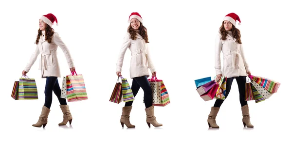 穿冬衣的女人在买圣诞礼物 — 图库照片