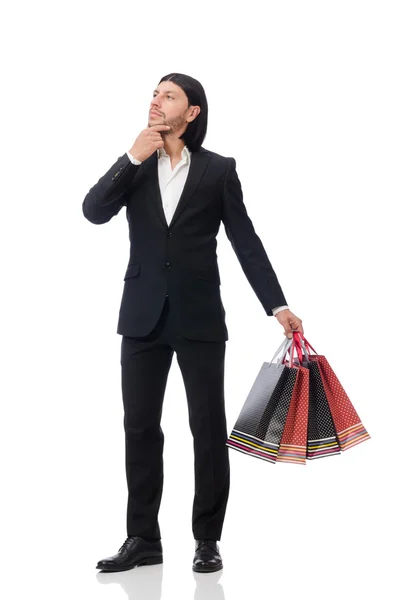 Traje negro hombre sosteniendo bolsas de plástico aisladas en blanco —  Fotos de Stock