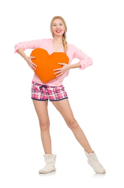 Pretty girl holding orange cushion isolated on white — Stock Photo, Image