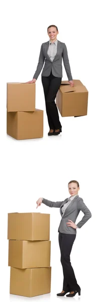 Composite image of woman with boxes on white — Stock Photo, Image