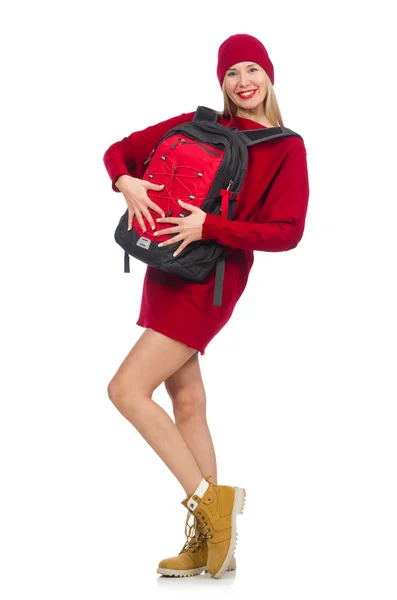 Menina bonita em vestido vermelho e mochila isolada no branco — Fotografia de Stock