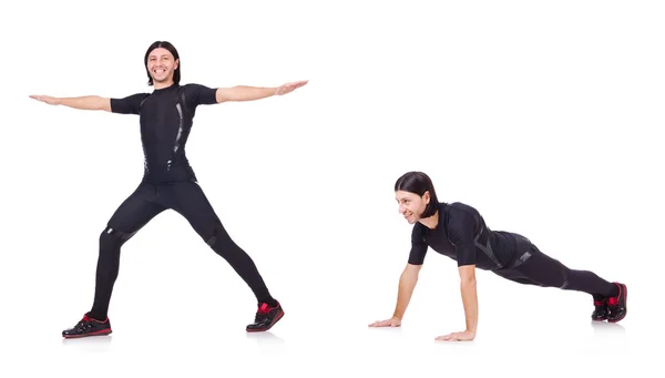 Jovem fazendo exercícios em branco — Fotografia de Stock