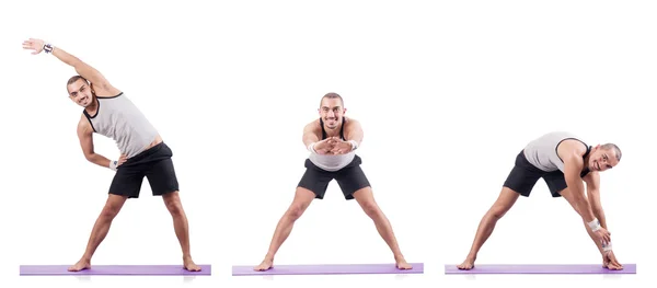 Man doing exercises on white — Stock Photo, Image