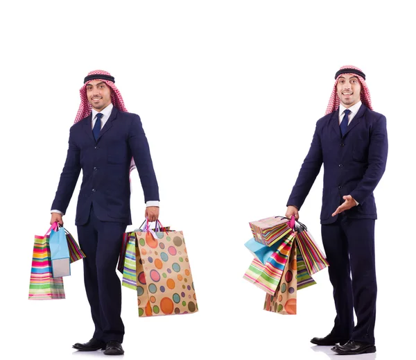 Bărbat arab cu cadouri de cumpărături pe alb — Fotografie, imagine de stoc