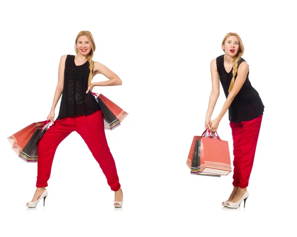 Ensemble de femme avec sacs à provisions sur blanc — Photo