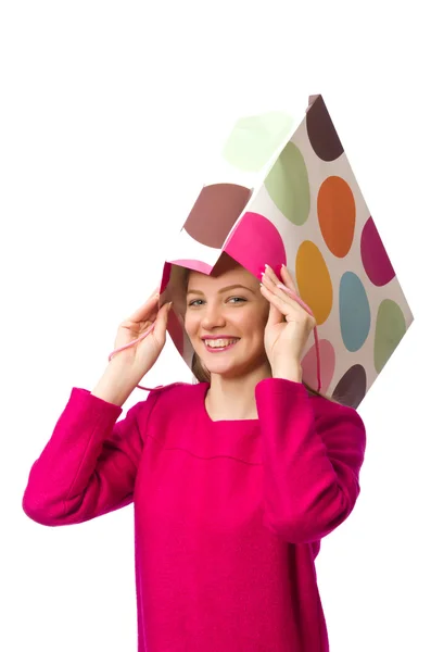 Shopper Mädchen in rosa Kleid mit Plastiktüte — Stockfoto