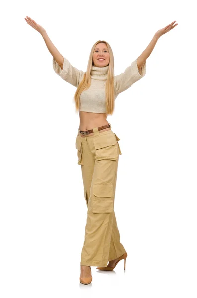 Mooie vrouw in beige broek geïsoleerd op wit — Stockfoto