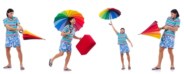 Cestovatel s červeným pouzdrem a deštníkem izolované na bílém — Stock fotografie