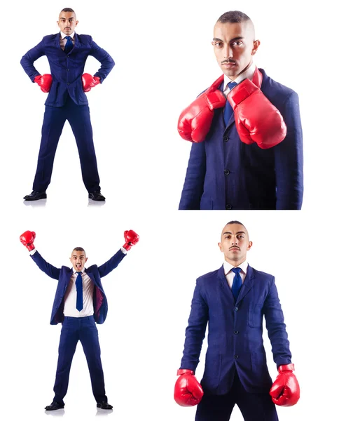 Komea liikemies nyrkkeilyhanskat kädessä — kuvapankkivalokuva