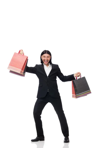 Traje negro hombre sosteniendo bolsas de plástico aisladas en blanco —  Fotos de Stock